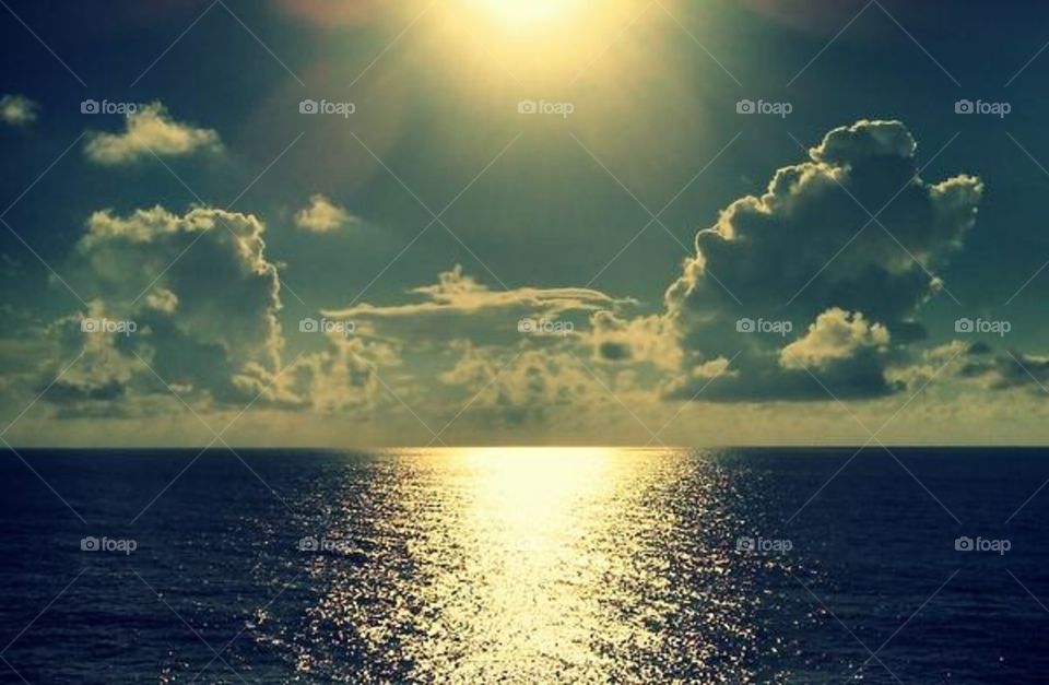 Sunset on the Atlantic Ocean, while sailing on a cruise ship. Sunset, Atlantic Ocean, clouds, water, wall art, filtered