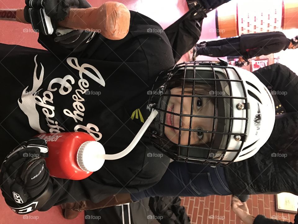 Cute young female hockey player