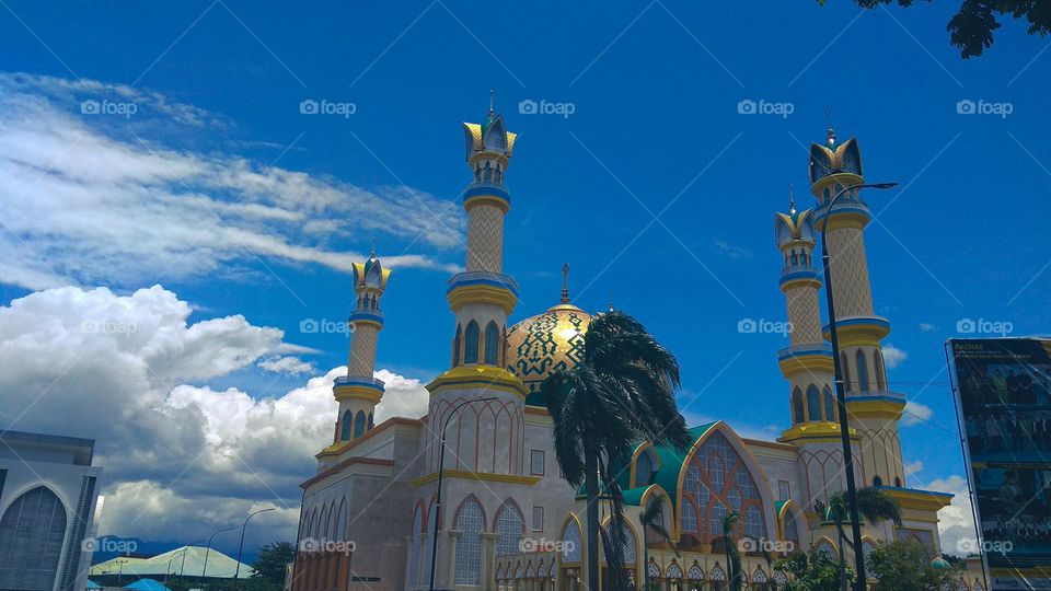 Landscape view of the Great Mosque of Hubbul Wathan Islamic Center Mataram, this mosque with golden domes is located in the center of the city of Mataram, Indonesia.