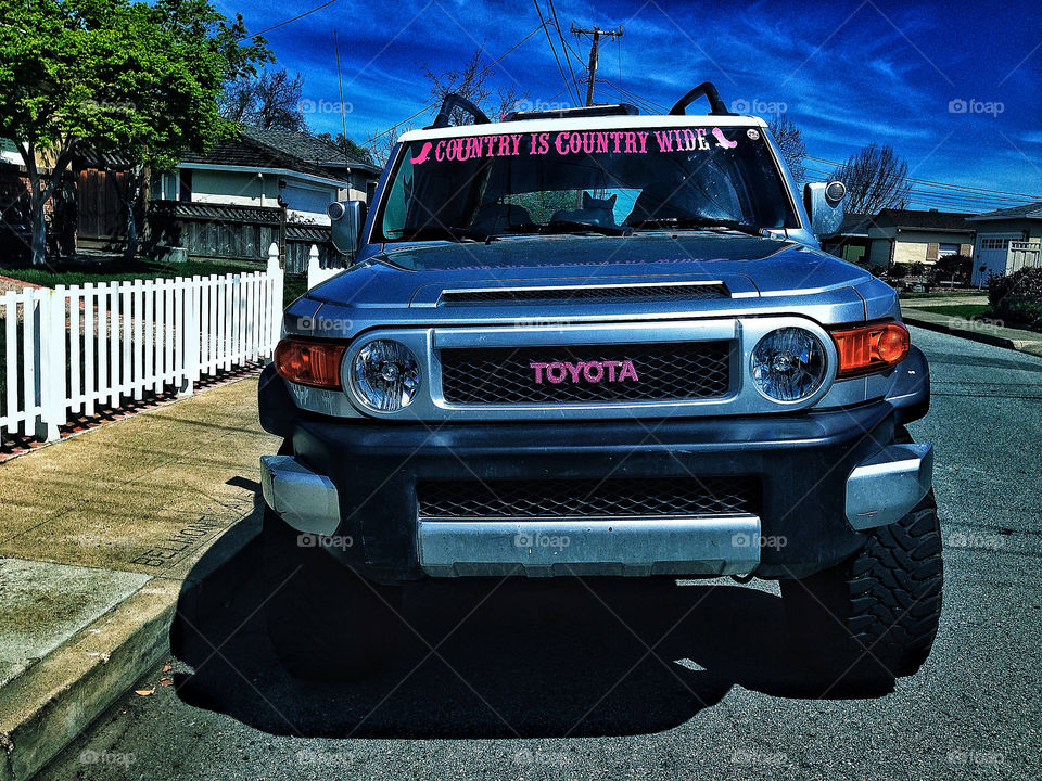 American pink Toyota FJ Cruiser with cowgirl power stickers