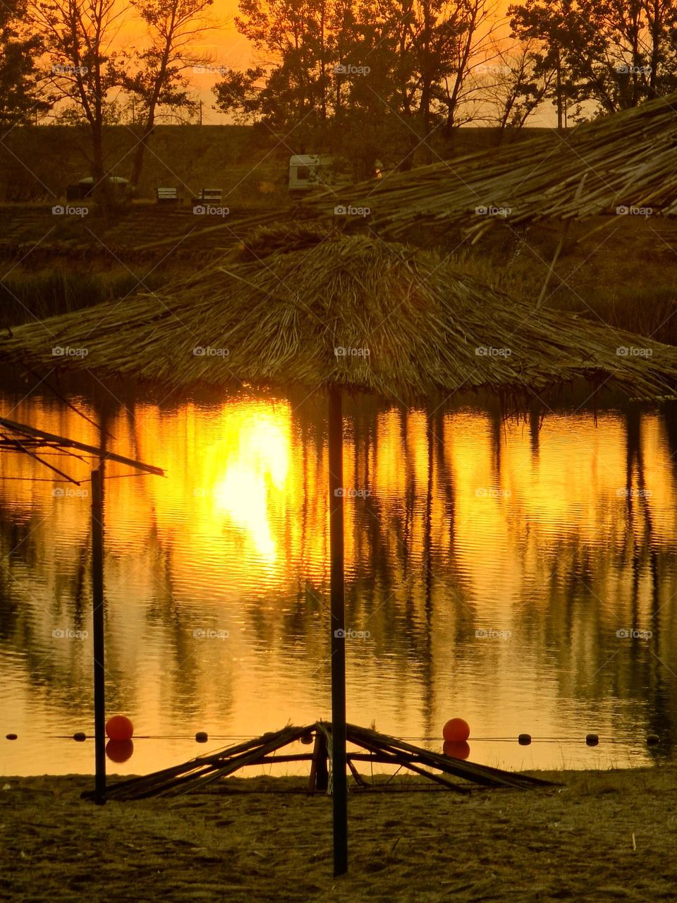 sunset reflected in the lake Ghioroc