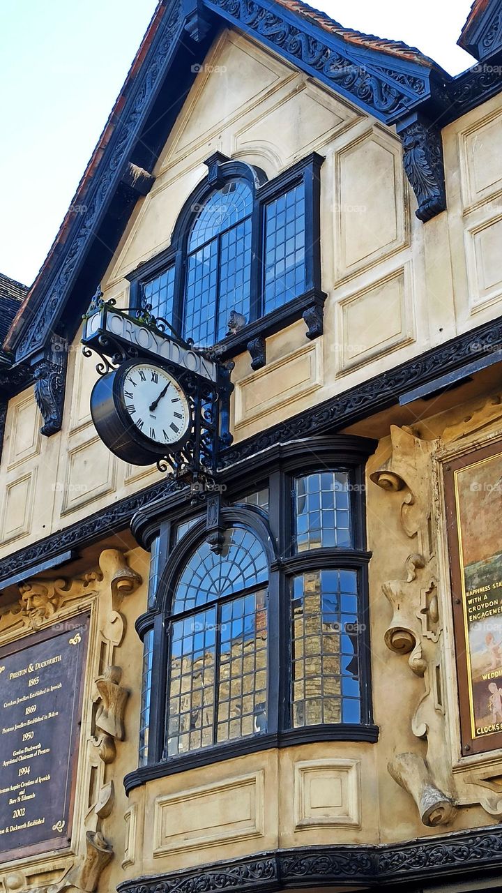 Croydon's Ipswich windows, architectural decoration, clock, Tavern Street, England