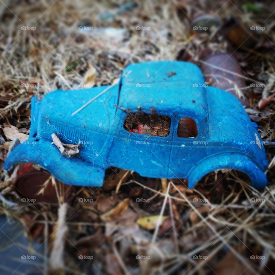 old car toy found in the woods