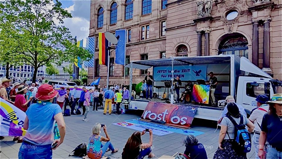 A peace demonstration is being held at the occasion of the “Evangelischer Kirchentag”, the protestant church day in “Nürnberg”, Germany. Speeches are being held from the bandstand as well as music performed. 2023. Hypnotic Productions