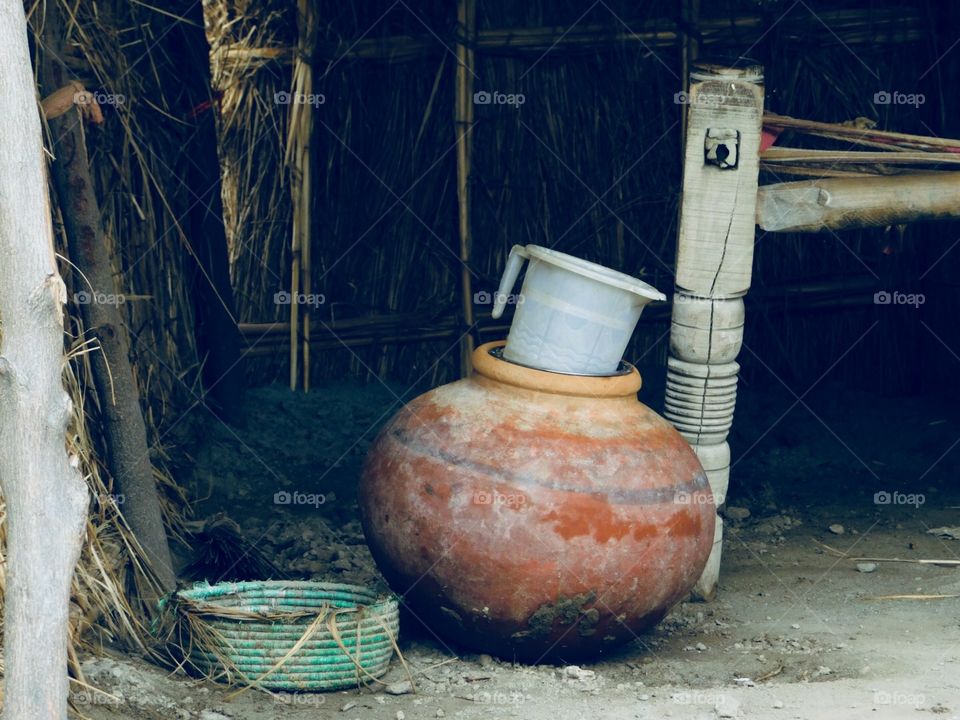 An ancient way to keep water safe and pure that is a a kind of pot which is made by soil it contains all minerals . It was invented in India 🇮🇳