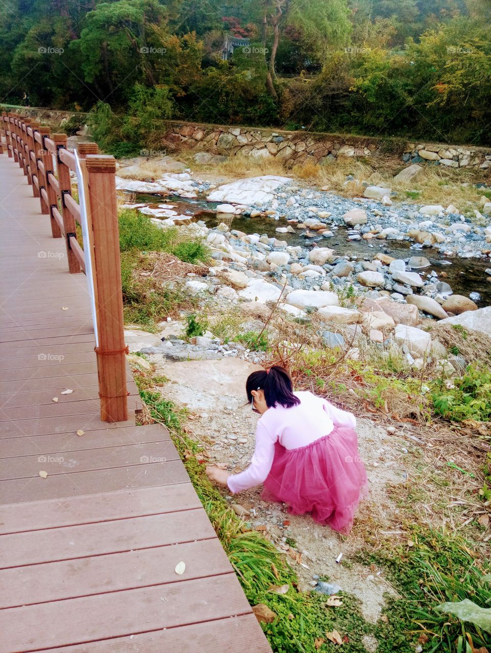 She ""loves"" to touch every stone that she steps on.
Just how her "Heart" longing to watch every ""Stones in the Galaxy""

For she's "Blind "so she "can't see"
But her "Heart" can "Feel and Understand"
that every stones have its own ""Mysteries""