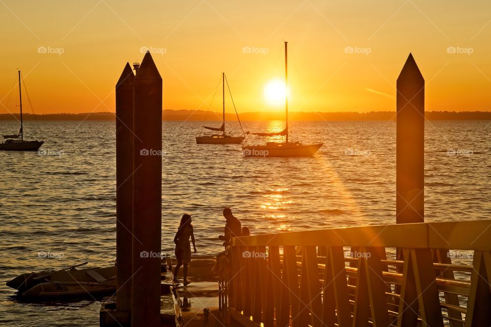 Silhouette of a harbor during sunset 