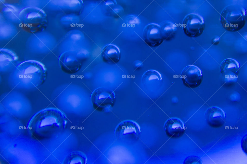  Glass bubbles in blue glass lamp