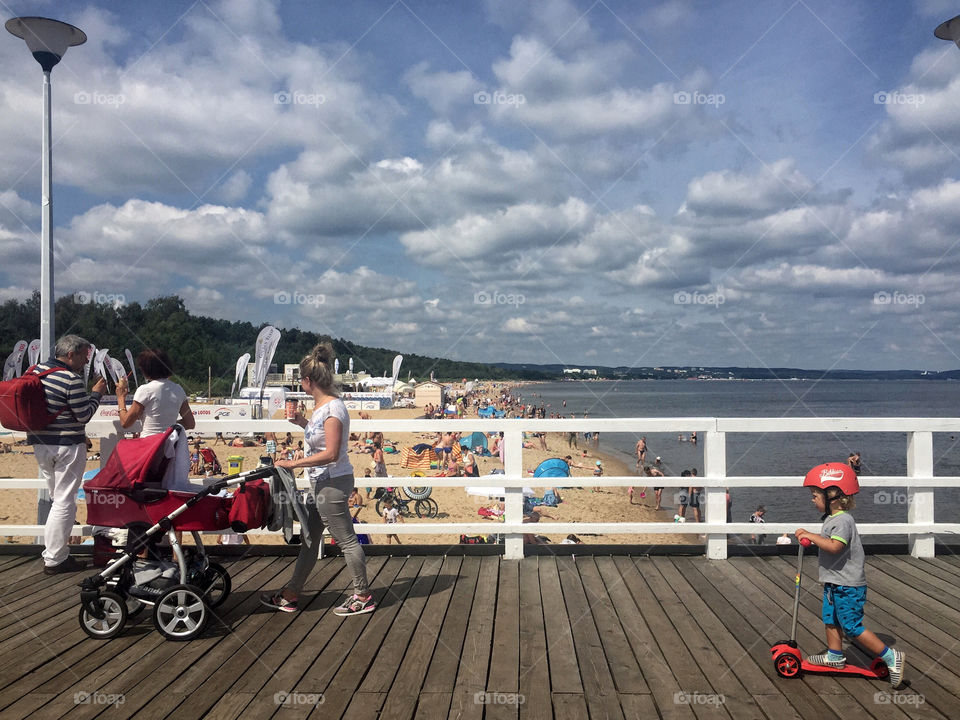 People enjoying at sea side