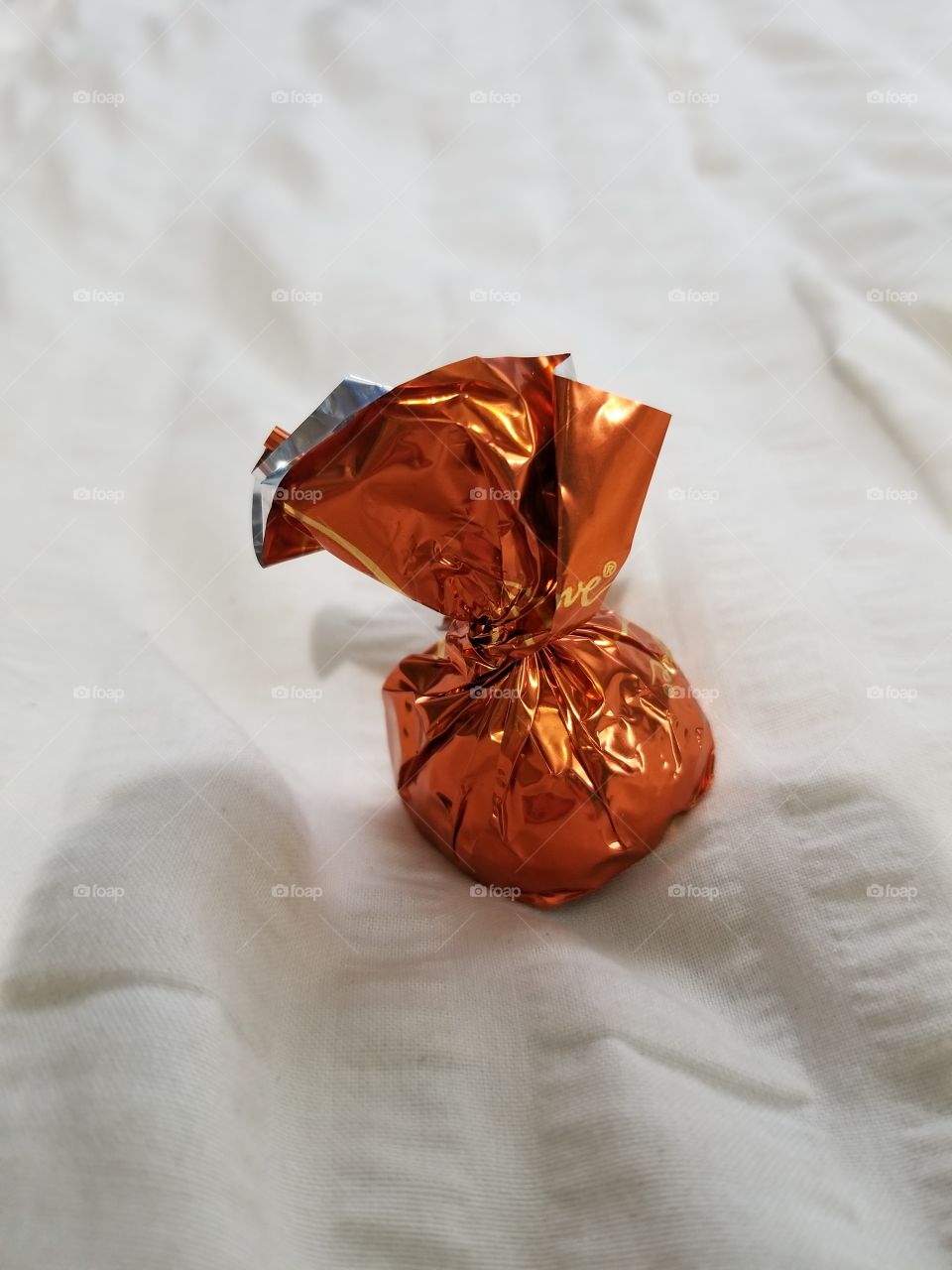 a piece of wrapped chocolate