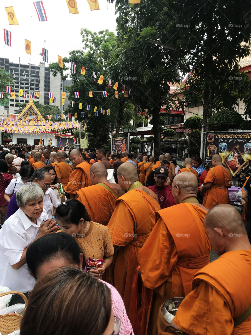 Pathum Thani, Thailand – October 25, 2018 : A photo of equipment and money for “Thot Kathin” is the annual merit-making ceremony in which new yellow robes are presented to Buddhist monks by laymen.