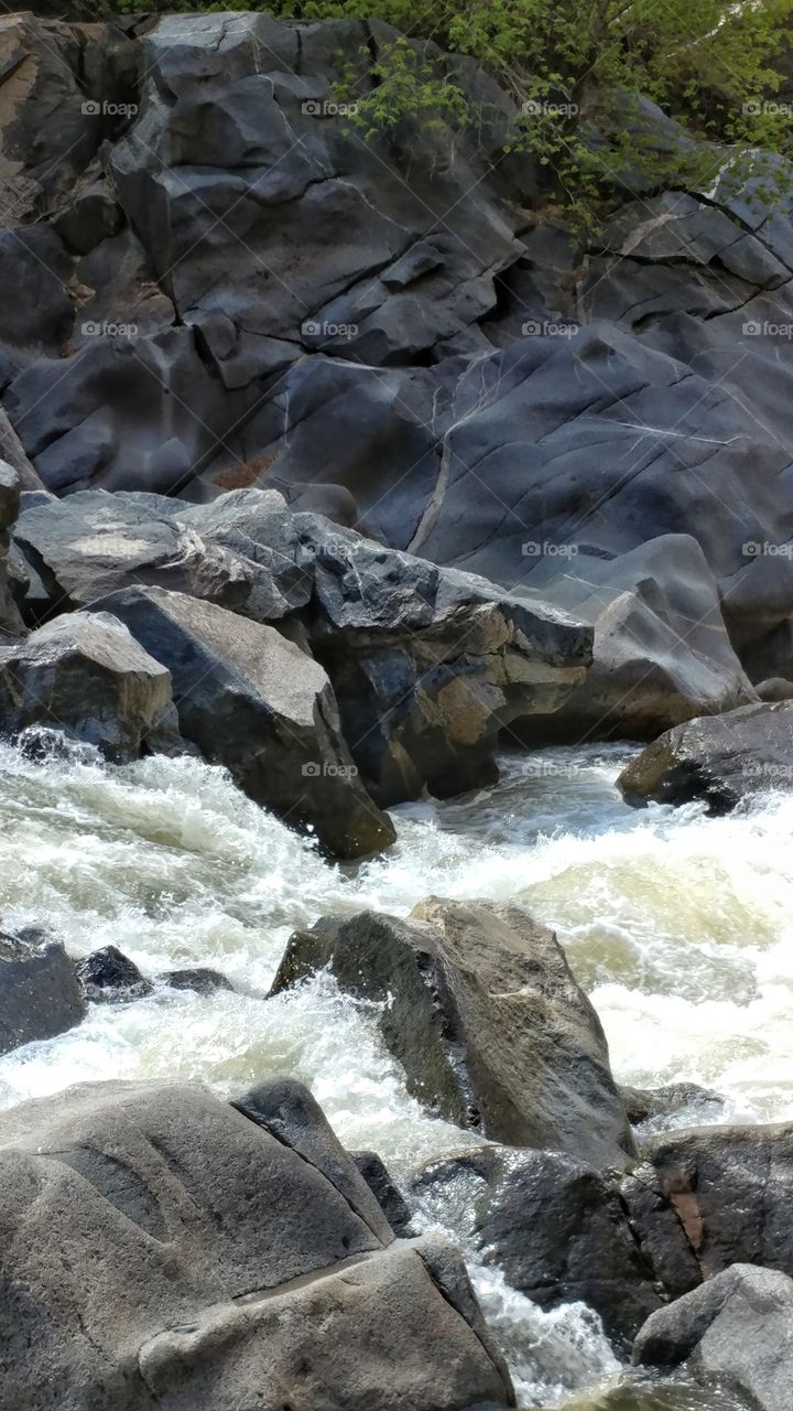 Witnessing the power of water as it rushes through huge boulders on its trip through Glenwood Canyon.