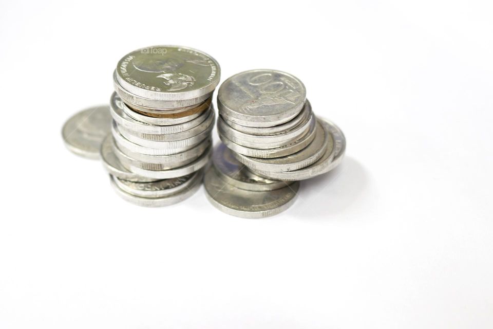 Coins are part of the medium of exchange in economics and business