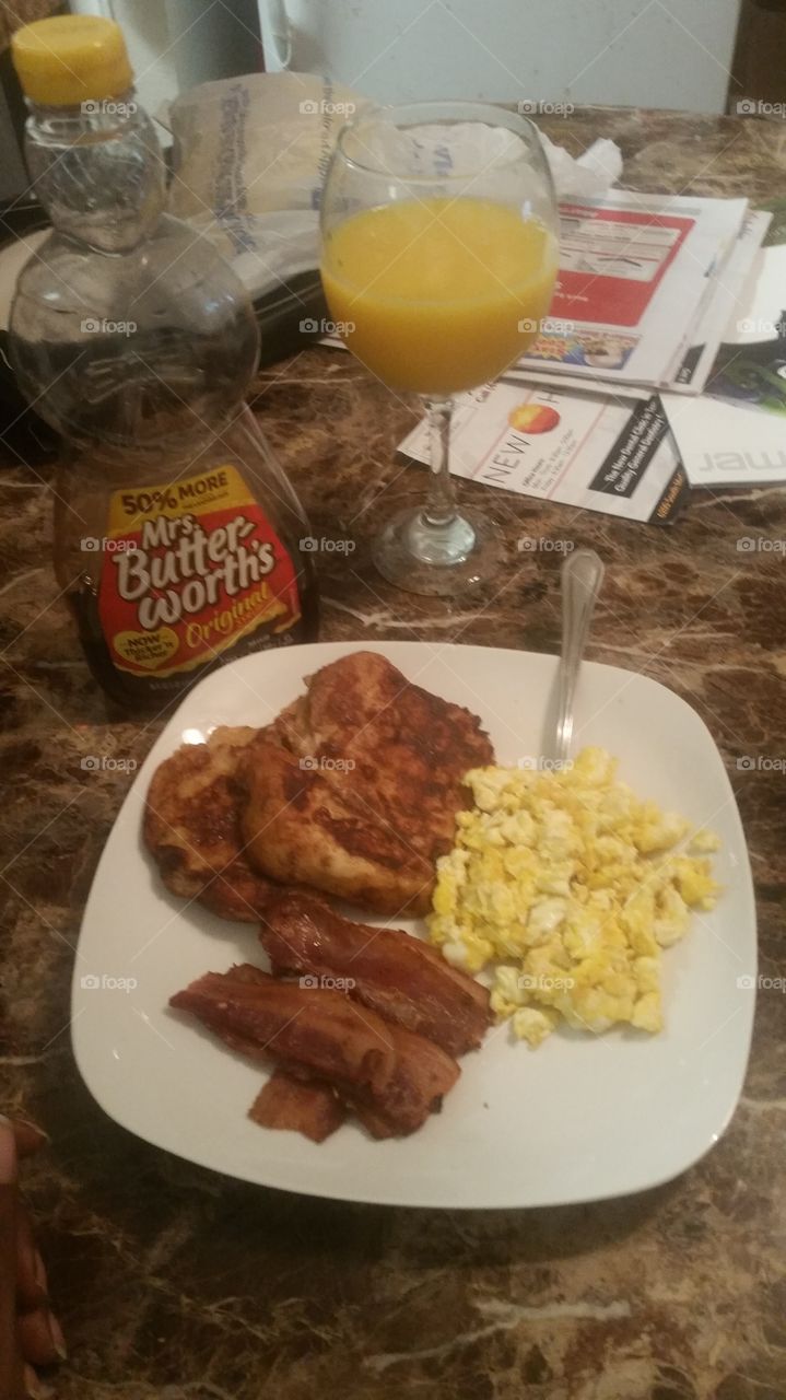 french toast, scamble eggs and bacon