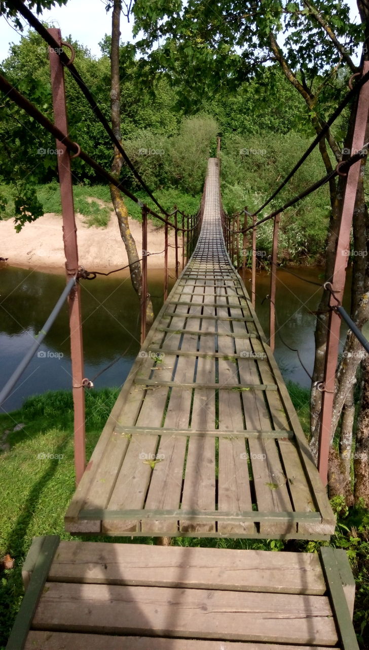Old wooden hanging bridge