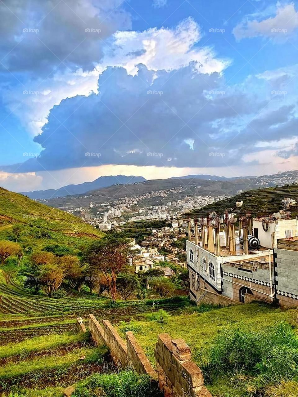 Glory be to God, the magnificent and picturesque view and the natural green trees are a view that is nothing more wonderful than it