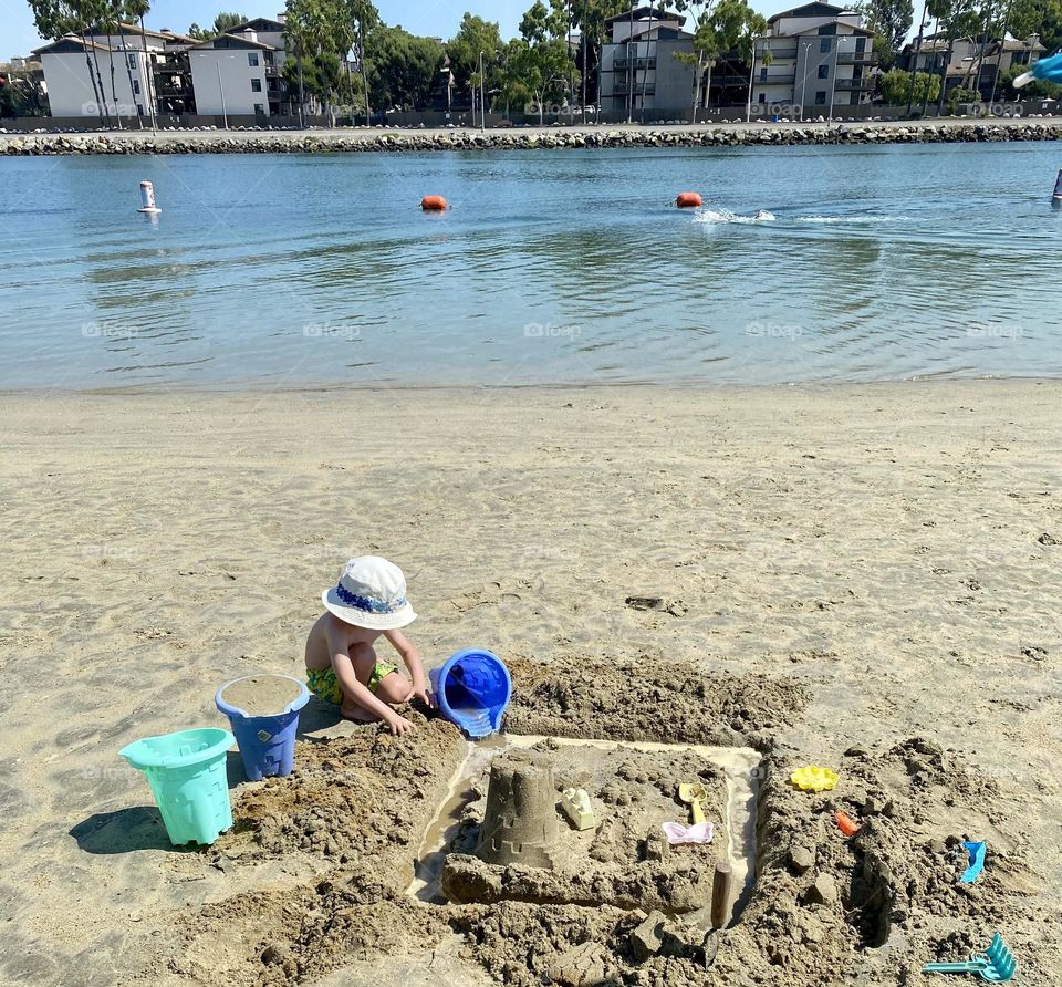 Playing with sand toys