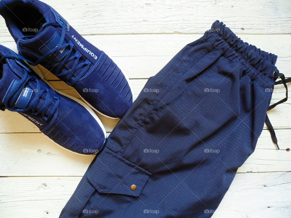 blue sport sneakers firm adidas and cargo pants firm Rextim