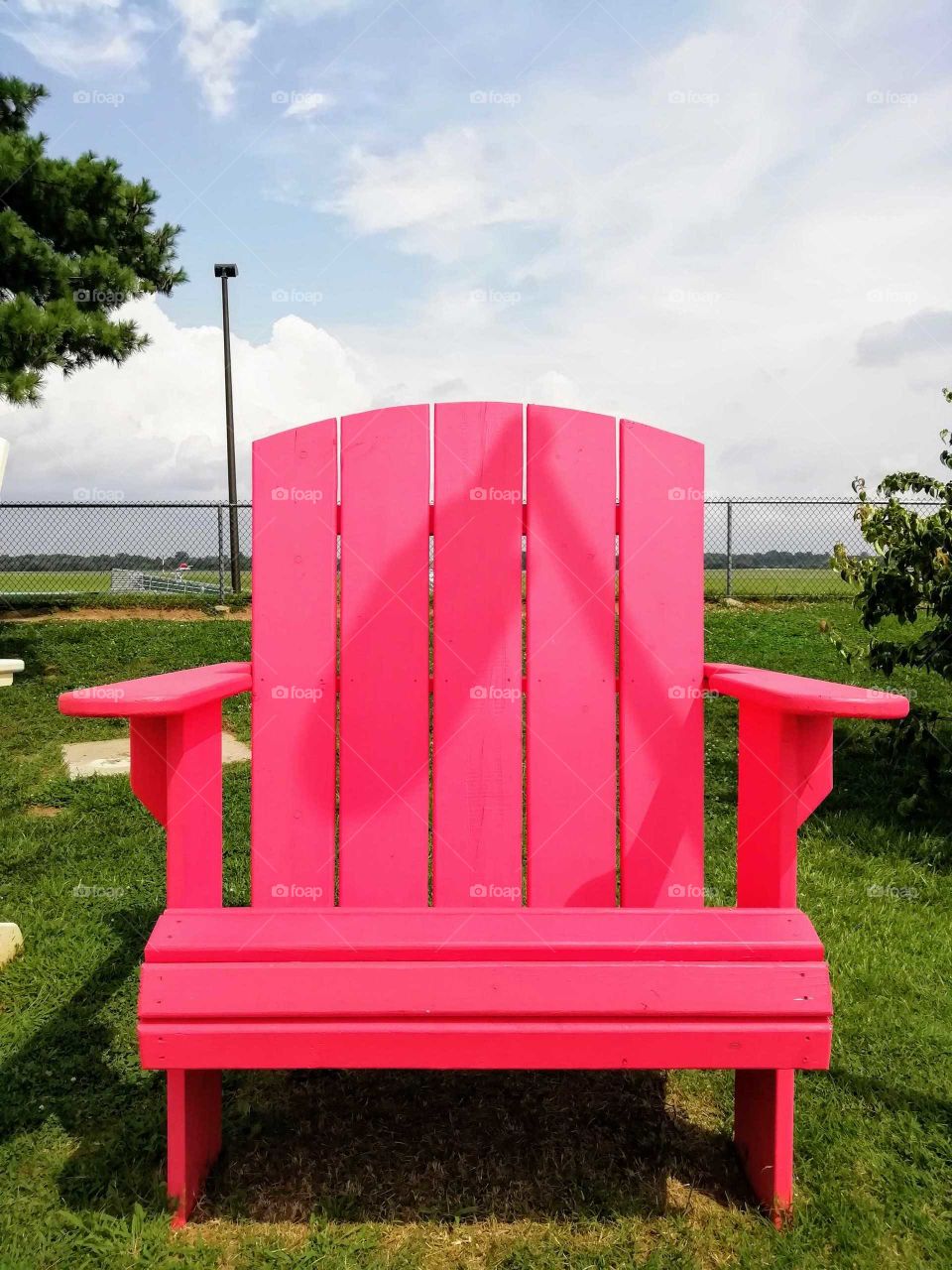 Giant pink wooden chair