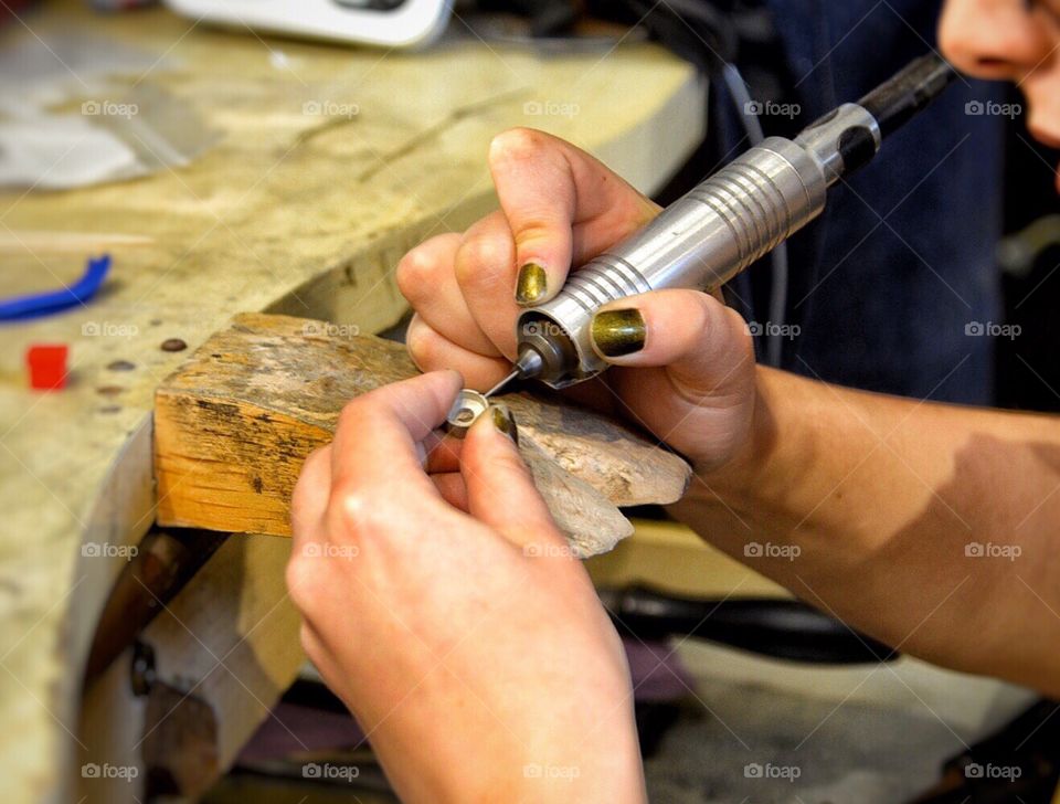 Woman working on a ring
