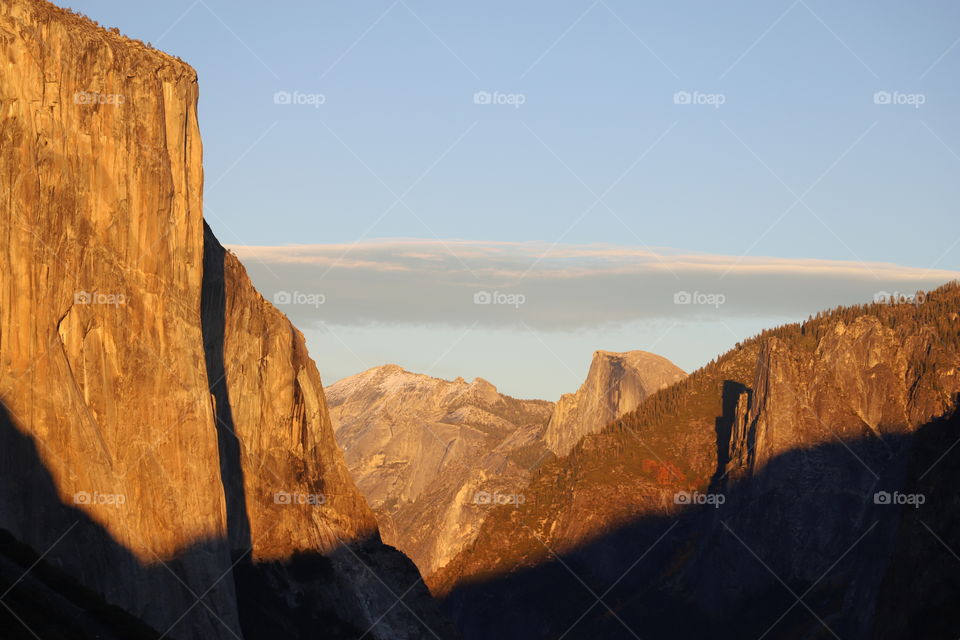 Peak of the rocky  mountains glowing on sunset 