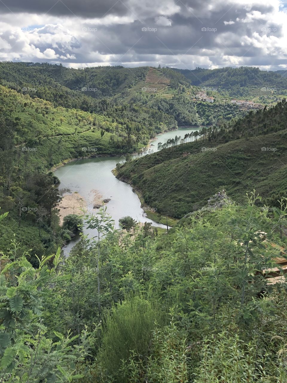 A part of the River Zêzere winds through green and luscious hills and forests - no edits, no filter, #truephotos, true nature