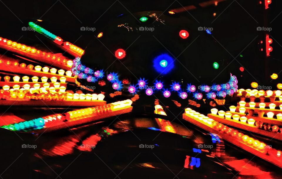 Bright neon lights of carnival ride