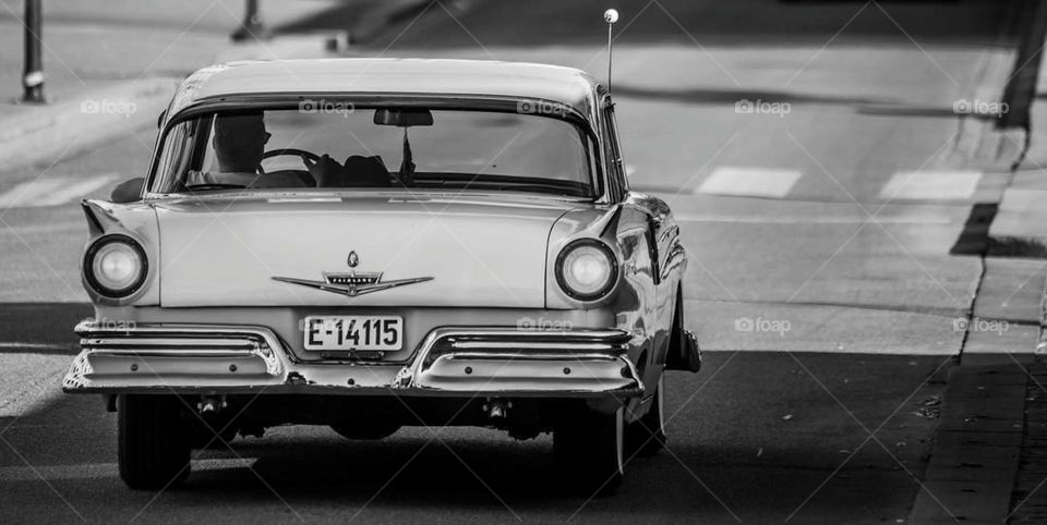 The road stretches ahead, a journey into the past, and a drive into the future