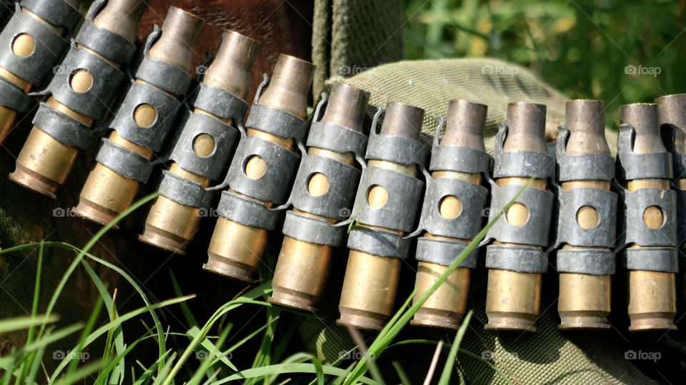 Old Belt Of Cartridges In The Grass