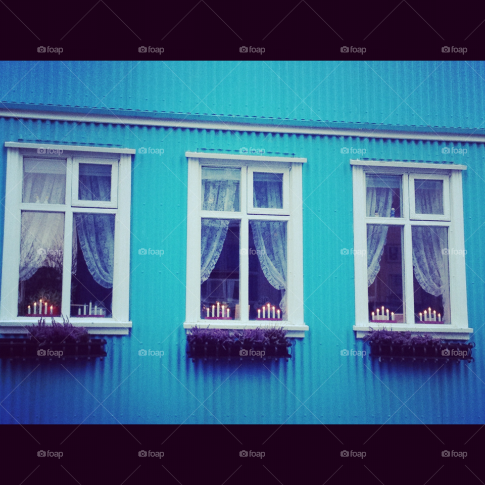 candles blue windows building by charleyb