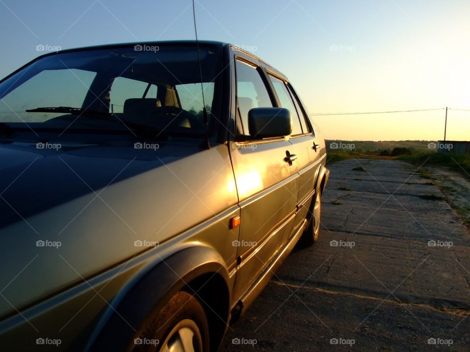 car at sunset