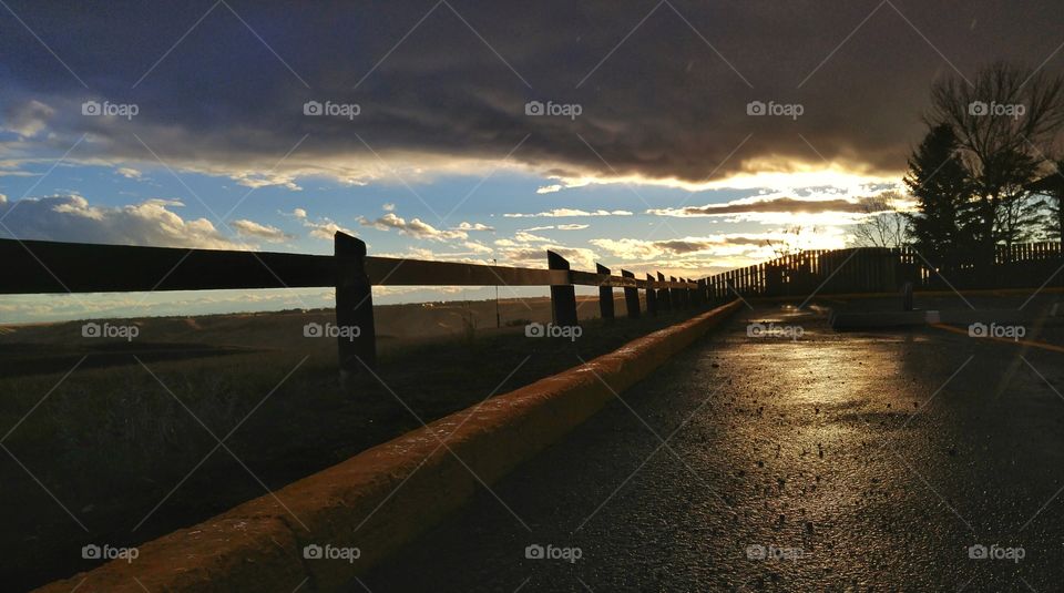 Storm clouds after rain over street