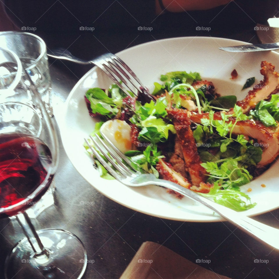 Parisian lunch red wine and salad Paris France