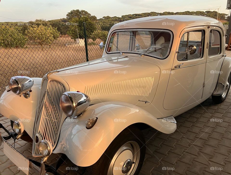 Lonely vintage car in evening light