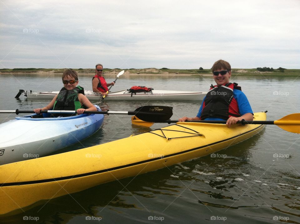 Adventure boys in kayaks