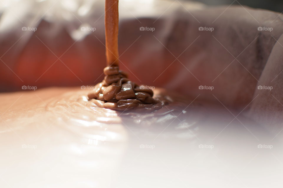 Pouring chocolate in a mould