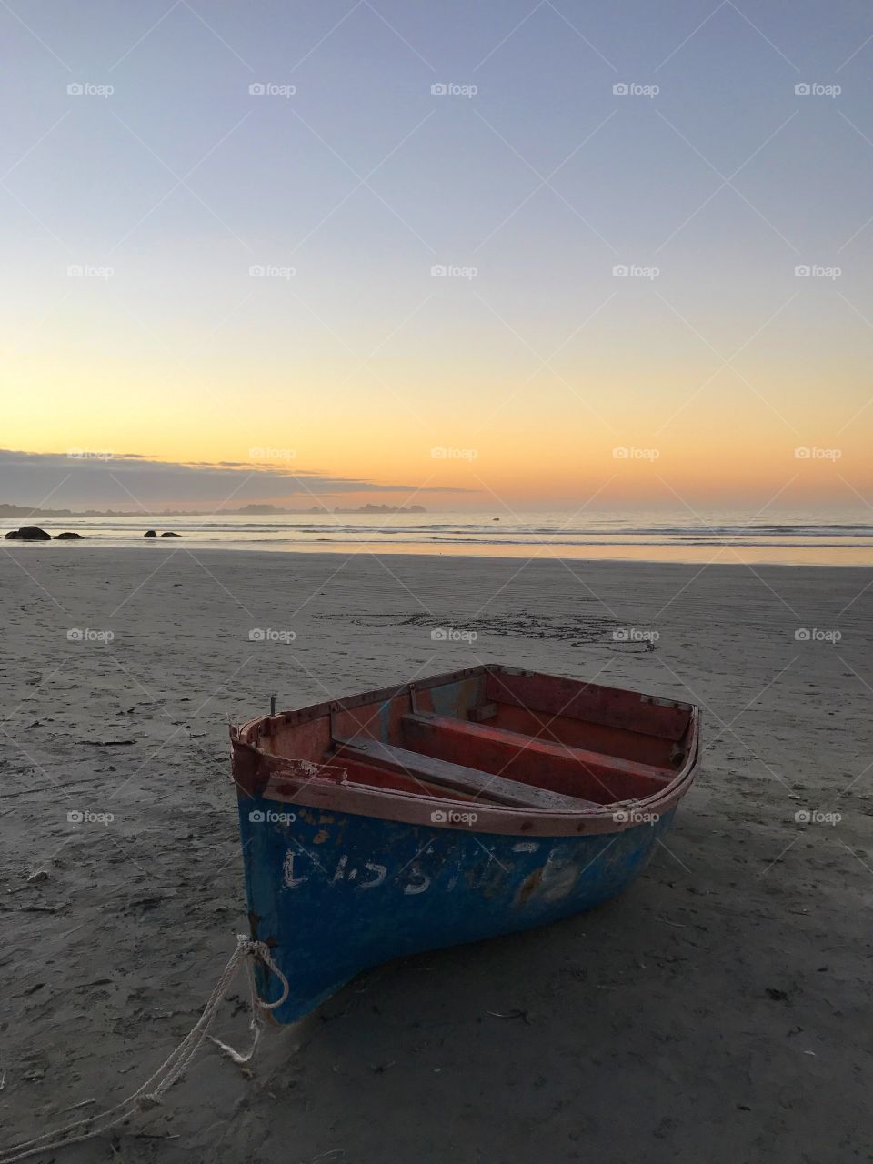 Lonely boat at Paternoster sunset