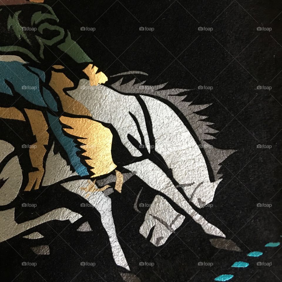 Close up horse design on suede