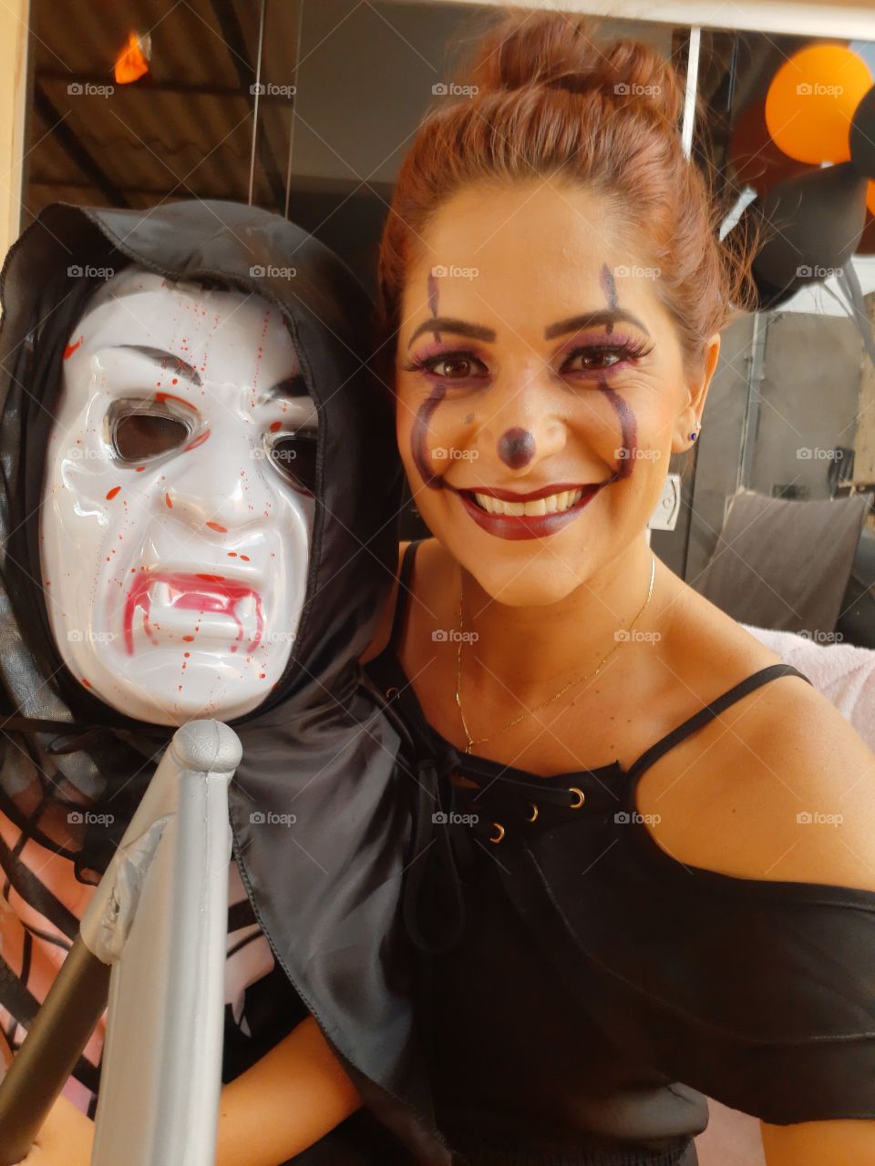 cute boy and mother dressed in halloween theme