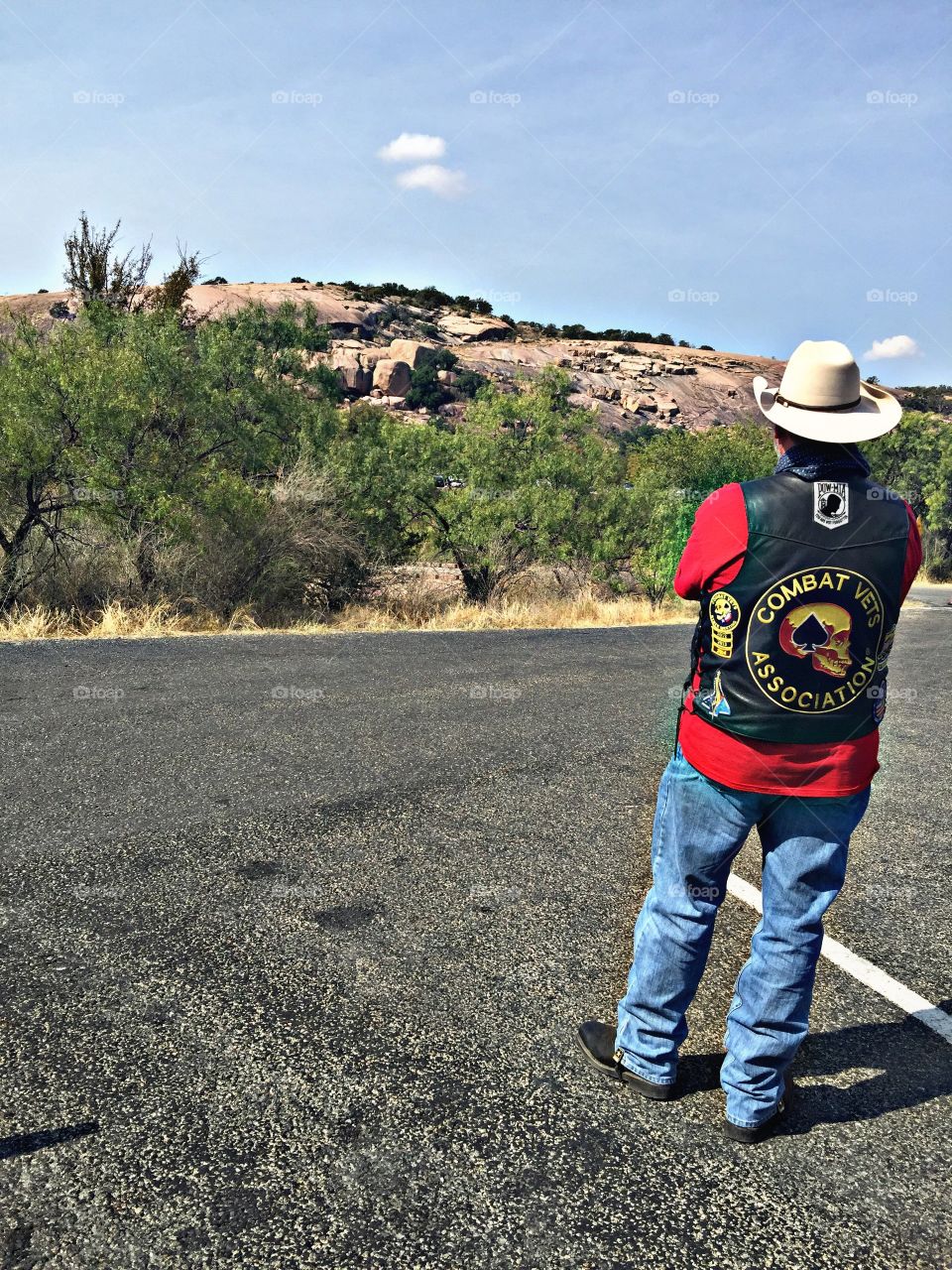 Enchanted rock. This is a Combat veteran looking at the enchanted rock in Texas