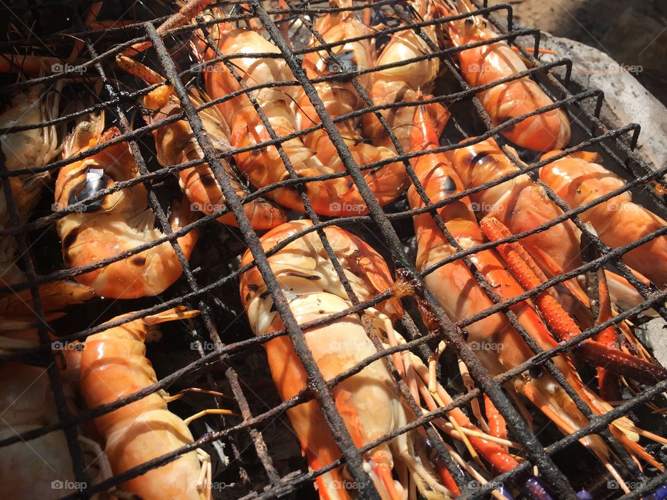grilled shrimp on stove. Seafood 