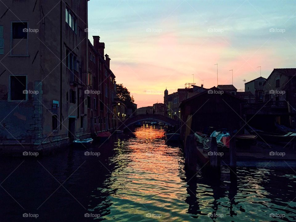 Sunset in Venice.. Nightwalk in the inner city of Venice, Italy.