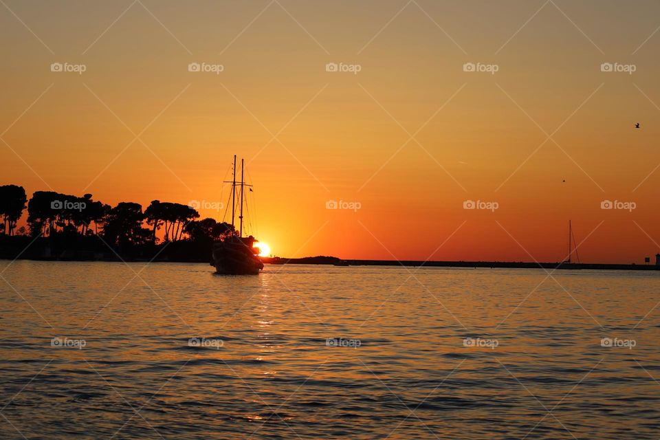 Sonnenuntergang in Poreč, Istrien, Kroatien