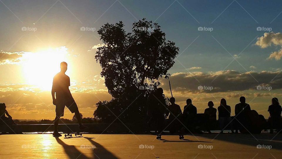 skyte at sunset. skiting at sunset in the Park of brasilia