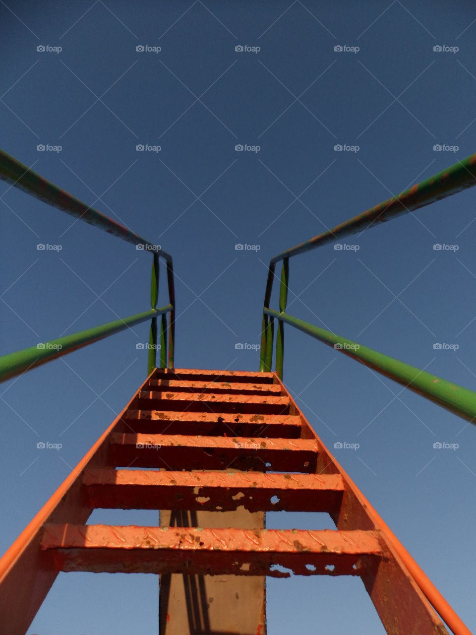 Steps to a slide in a playpark, taken from the bottem to give a todlers view