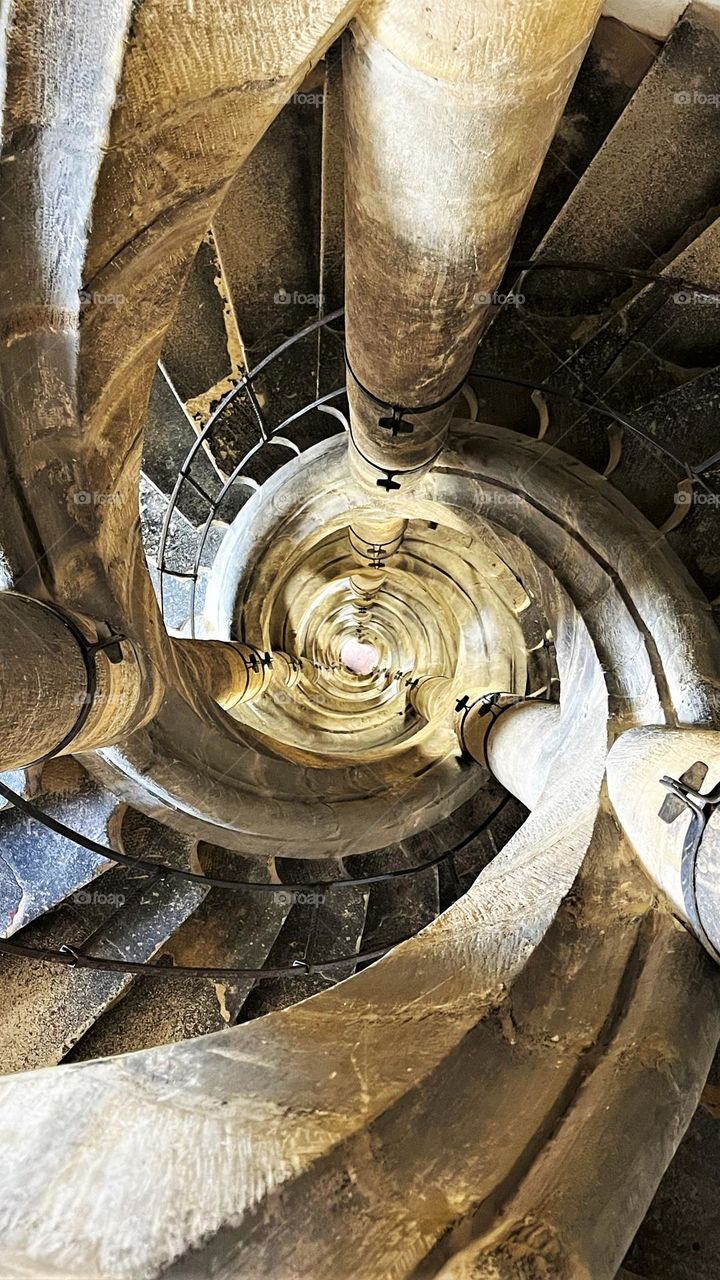 An amazing geometry of the spiral staircase. Two spiral staircases intertwine and lead to the very top of the tower.