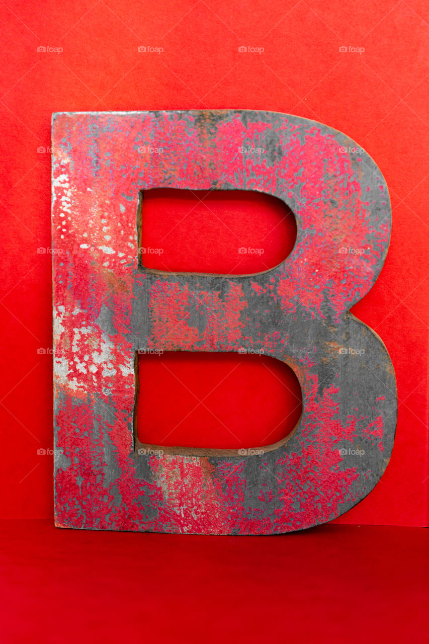 monochrome photography in red: letter B