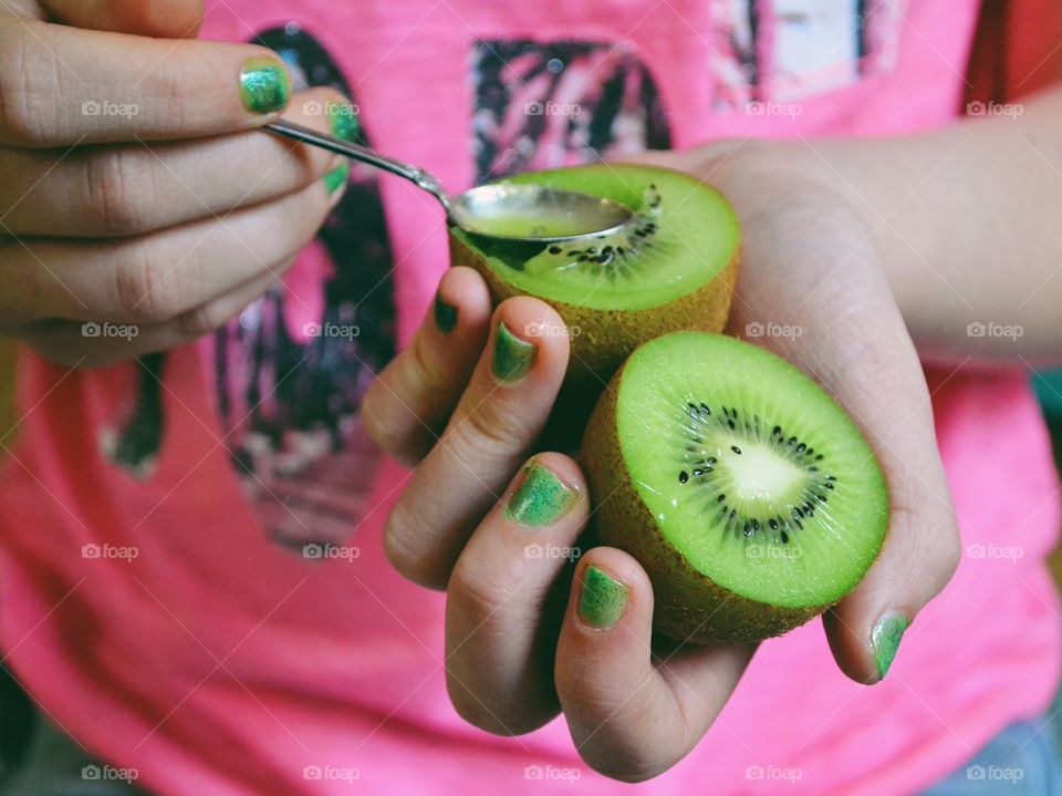 Eating kiwi fruit