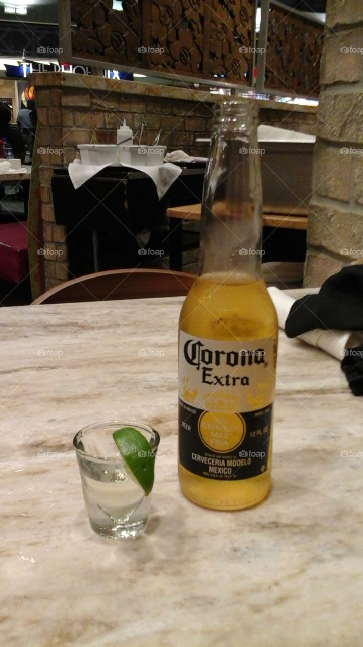 corona. having a drink at the phoenix airport