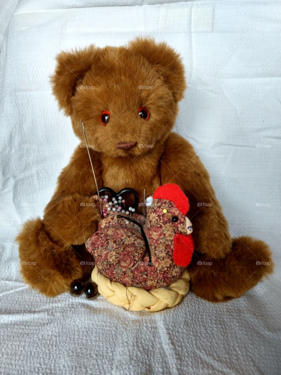 Teddy Bear and chicken pin cushion.